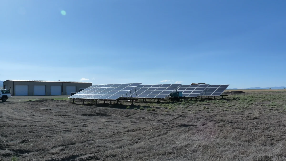 Solar panels generating on a mild, sunny day when grid demand is low